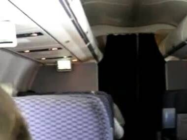 Hot blonde masturbates on a commercial flight - nvdvid.com