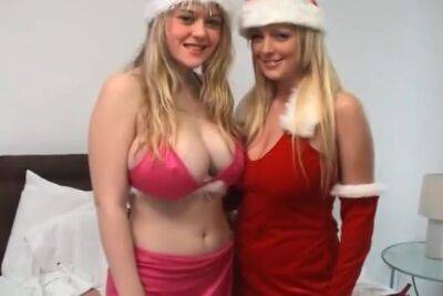 Two Teenage Blondes Dressed Appropriate For The Christmas Spirit - hotmovs.com - Usa